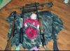 baby-alabama-fan-holding-gun-300x220.gif